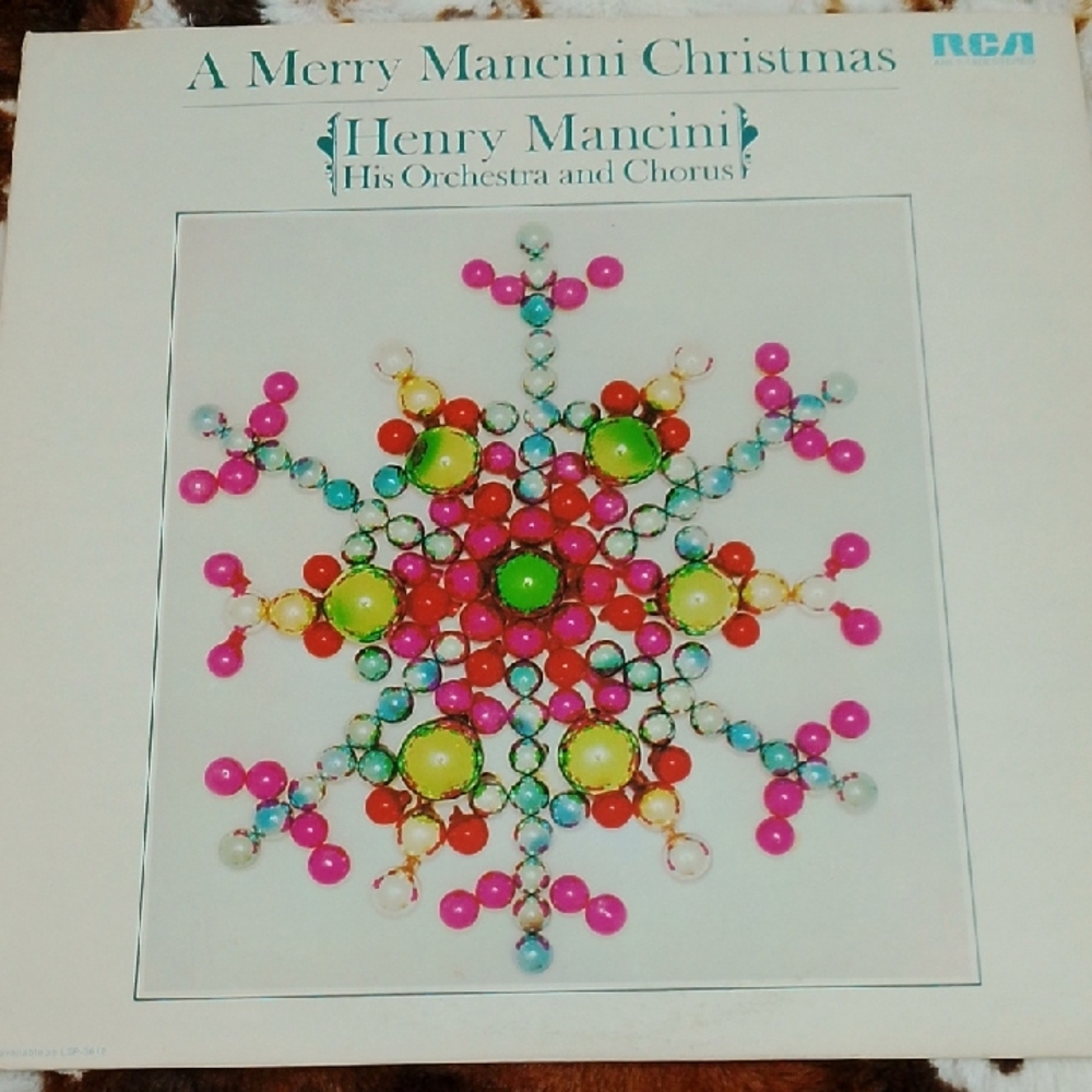 Henry Mancini Christmas Album with Colorful Snowflake Design